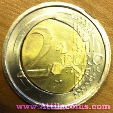 Error_Italy_2_euro_2005_off_center_planket_r.jpg